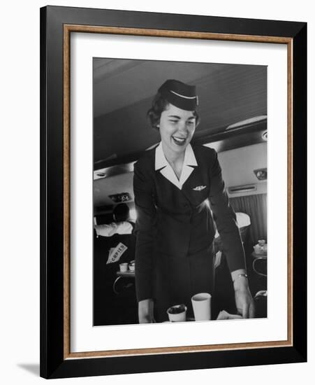 Airline Stewardess Seving Coffee-Peter Stackpole-Framed Photographic Print