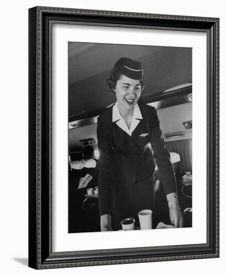 Airline Stewardess Seving Coffee-Peter Stackpole-Framed Photographic Print