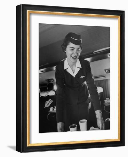 Airline Stewardess Seving Coffee-Peter Stackpole-Framed Photographic Print