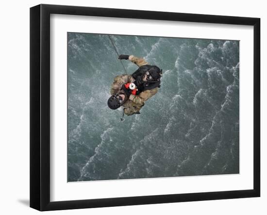 Airmen Are Hoisted Out of the Water During a Water Rescue Training Scenario-Stocktrek Images-Framed Photographic Print