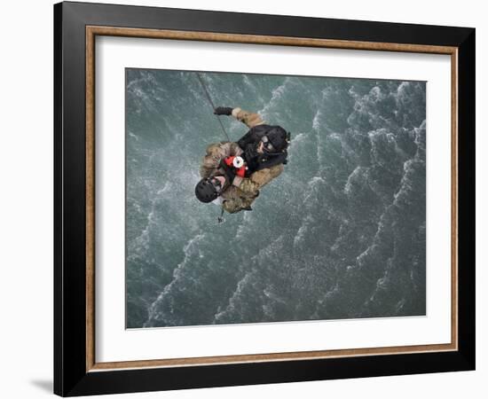 Airmen Are Hoisted Out of the Water During a Water Rescue Training Scenario-Stocktrek Images-Framed Photographic Print