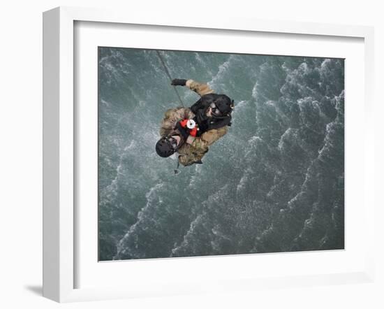 Airmen Are Hoisted Out of the Water During a Water Rescue Training Scenario-Stocktrek Images-Framed Photographic Print