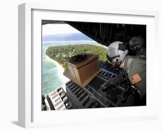 Airmen Push Out a Pallet of Donated Goods Over the Island of Yap from a C-130 Hercules-Stocktrek Images-Framed Photographic Print