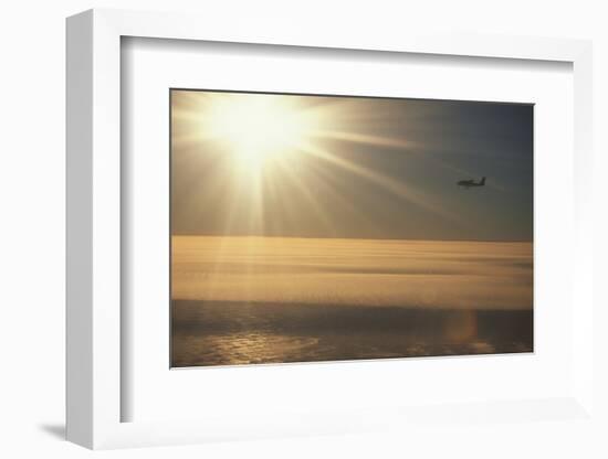 Airplane Flying over Ice-DLILLC-Framed Photographic Print