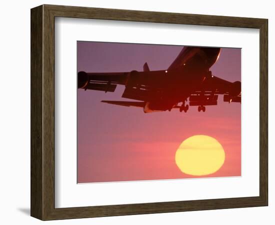 Airplane in Flight During Sunrise, Sunset-Mitch Diamond-Framed Photographic Print