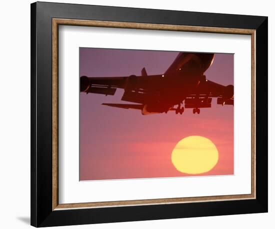 Airplane in Flight During Sunrise, Sunset-Mitch Diamond-Framed Photographic Print