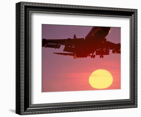 Airplane in Flight During Sunrise, Sunset-Mitch Diamond-Framed Photographic Print