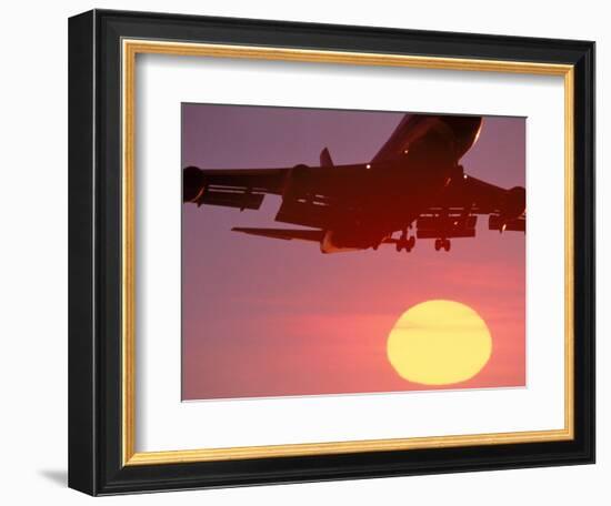 Airplane in Flight During Sunrise, Sunset-Mitch Diamond-Framed Photographic Print