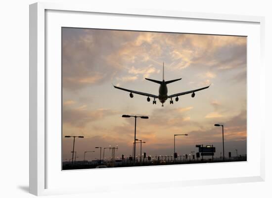 Airplane landing-Charles Bowman-Framed Photographic Print