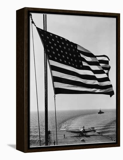 Airplane on Battleship Deck with American Flag in Foreground, World War II-null-Framed Stretched Canvas