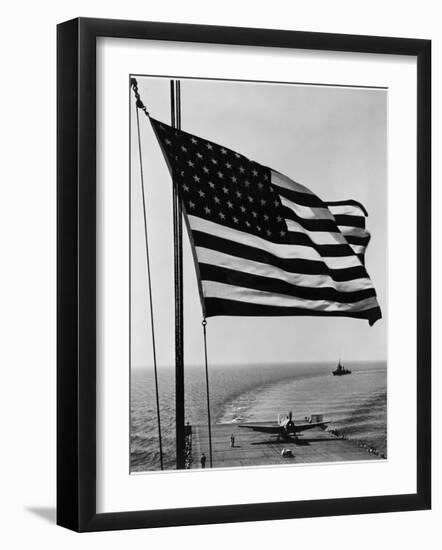 Airplane on Battleship Deck with American Flag in Foreground, World War II-null-Framed Photo