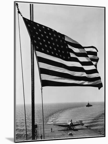 Airplane on Battleship Deck with American Flag in Foreground, World War II-null-Mounted Photo