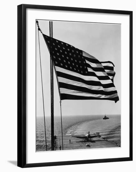 Airplane on Battleship Deck with American Flag in Foreground, World War II-null-Framed Photo