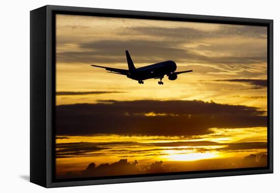 Airplane sunset-Charles Bowman-Framed Premier Image Canvas