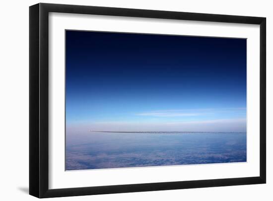 Airplane With Vapor Trail-null-Framed Photo