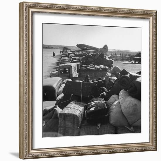 Airplanes Sitting on Airstrip at Airfield and Supplies Sitting in Trucks-Jack Birns-Framed Photographic Print