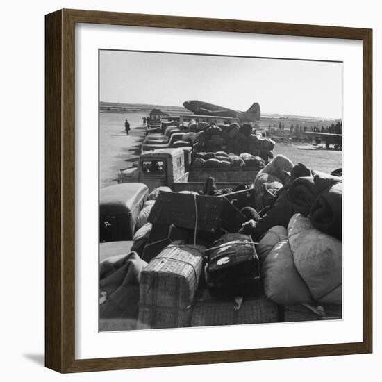 Airplanes Sitting on Airstrip at Airfield and Supplies Sitting in Trucks-Jack Birns-Framed Photographic Print