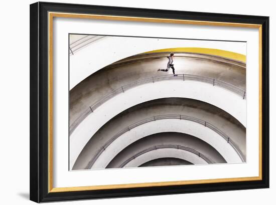 Airport Car Park, Stuttgart, Baden-Württemberg, Germany: A Male Runner Running Through A Car Park-Axel Brunst-Framed Photographic Print