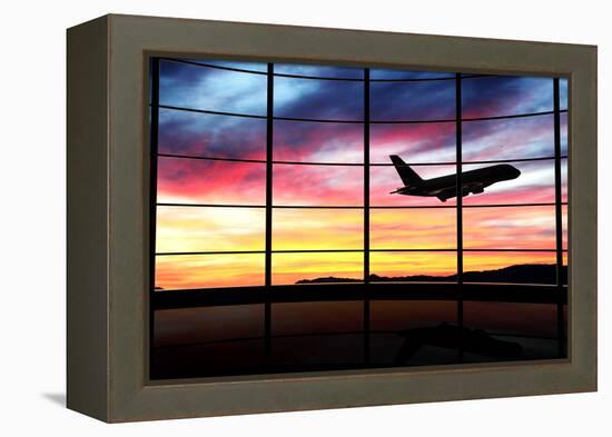 Airport Window with Airplane Flying at Sunset-viperagp-Framed Premier Image Canvas