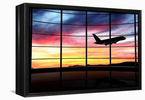 Airport Window with Airplane Flying at Sunset-viperagp-Framed Premier Image Canvas