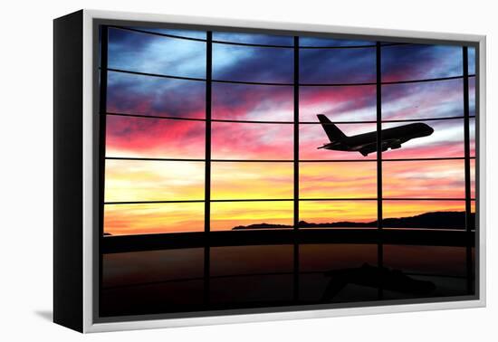 Airport Window with Airplane Flying at Sunset-viperagp-Framed Premier Image Canvas