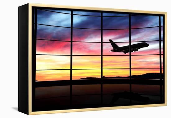 Airport Window with Airplane Flying at Sunset-viperagp-Framed Premier Image Canvas