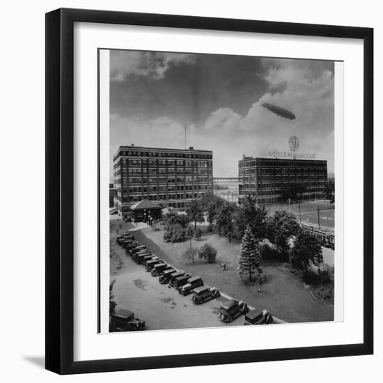 Airship over General Electric Building-null-Framed Photographic Print