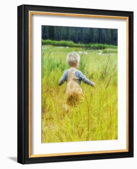 Alaska, 2 Year Old Child Playing in Tall Grass, Summertime-Savanah Stewart-Framed Photographic Print