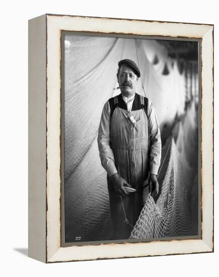 Alaskan Fisherman with Fishing Net, 1916-null-Framed Premier Image Canvas