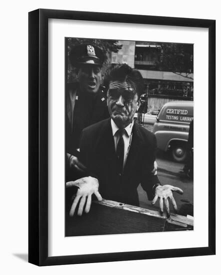 Albanian Demonstrator Hit as Police Broke Up Riot in Front of United Nations-Paul Schutzer-Framed Photographic Print