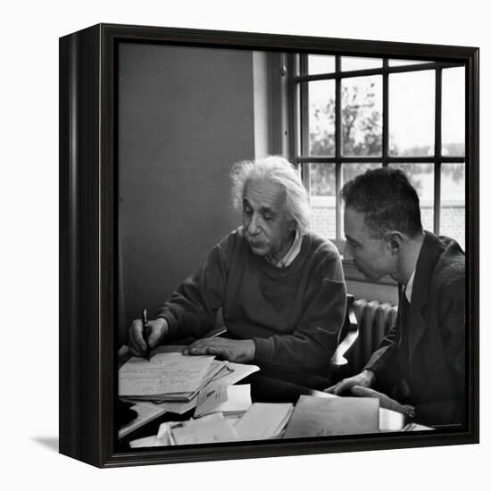 Albert Einstein, in Discussion with Robert Oppenheimer in Office Institute for Advanced Study-Alfred Eisenstaedt-Framed Premier Image Canvas