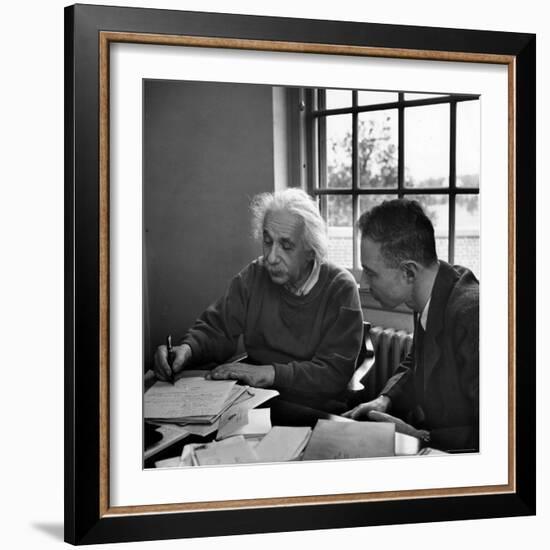 Albert Einstein, in Discussion with Robert Oppenheimer in Office Institute for Advanced Study-Alfred Eisenstaedt-Framed Premium Photographic Print