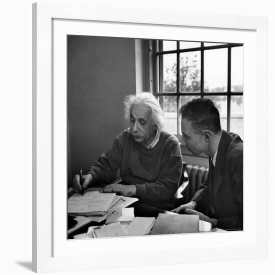 Albert Einstein, in Discussion with Robert Oppenheimer in Office Institute for Advanced Study-Alfred Eisenstaedt-Framed Premium Photographic Print