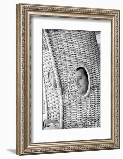 Alberto Sordi Through the Eyelet of a Wicker Armchair-Marisa Rastellini-Framed Photographic Print