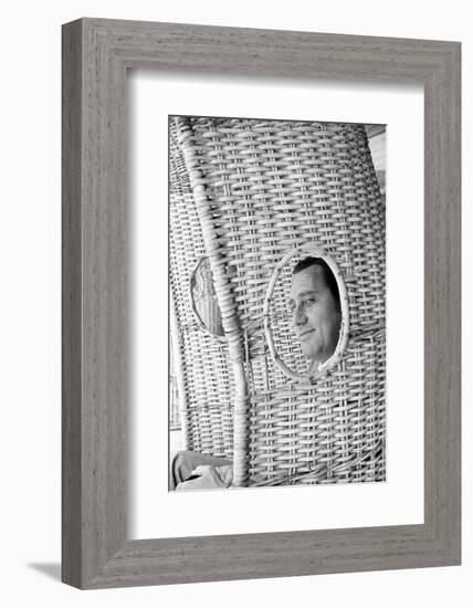 Alberto Sordi Through the Eyelet of a Wicker Armchair-Marisa Rastellini-Framed Photographic Print