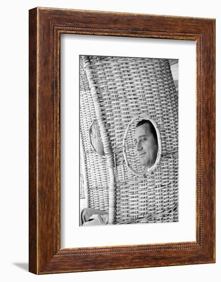 Alberto Sordi Through the Eyelet of a Wicker Armchair-Marisa Rastellini-Framed Photographic Print