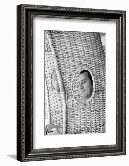 Alberto Sordi Through the Eyelet of a Wicker Armchair-Marisa Rastellini-Framed Photographic Print