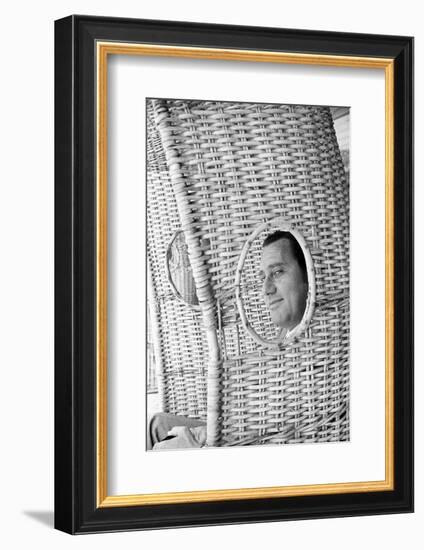 Alberto Sordi Through the Eyelet of a Wicker Armchair-Marisa Rastellini-Framed Photographic Print