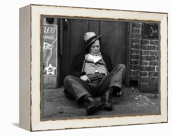 Alcoholic Vagrant Sleeping in a Doorway-null-Framed Premier Image Canvas