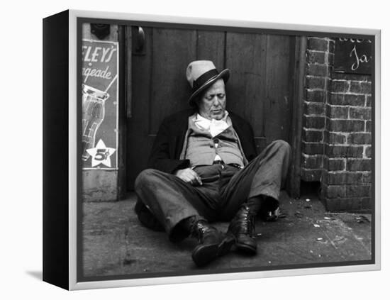 Alcoholic Vagrant Sleeping in a Doorway-null-Framed Premier Image Canvas