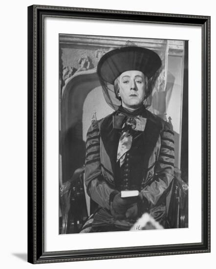 Alec Guinness During a Scene from the Movie "Kind Hearts and Coronets"-null-Framed Premium Photographic Print