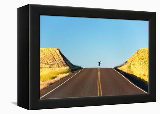 Alek Engerbretson Skateboarding Down A Rural Highway Near Oakesdale, Washington-Ben Herndon-Framed Premier Image Canvas