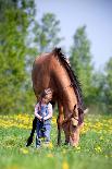 Child Sits On A Horse In Meadow Near Small River-Alexia Khruscheva-Photographic Print