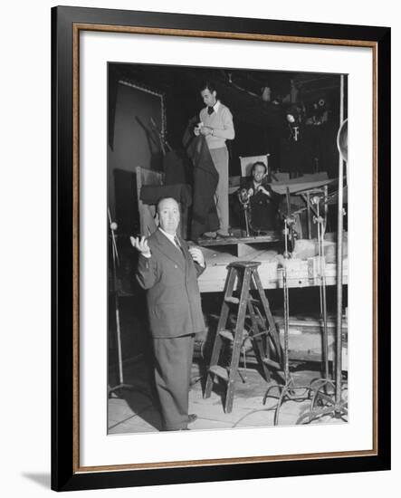 Alfred HitchcockOn Film Set During Shooting of "Lifeboat"-null-Framed Premium Photographic Print