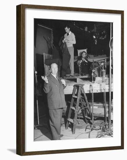 Alfred HitchcockOn Film Set During Shooting of "Lifeboat"-null-Framed Premium Photographic Print