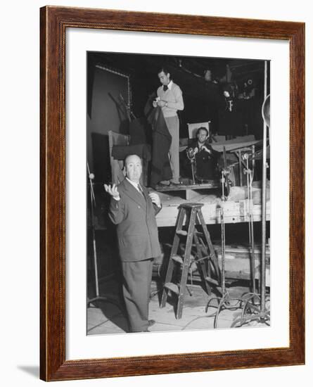 Alfred HitchcockOn Film Set During Shooting of "Lifeboat"-null-Framed Premium Photographic Print