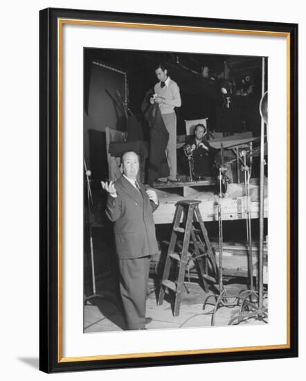 Alfred HitchcockOn Film Set During Shooting of "Lifeboat"-null-Framed Premium Photographic Print