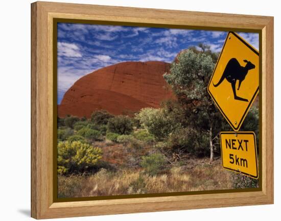 Alice Springs, Traffic Sign Beside Road Through Outback, Red Rocks of Olgas Behind, Australia-Amar Grover-Framed Premier Image Canvas