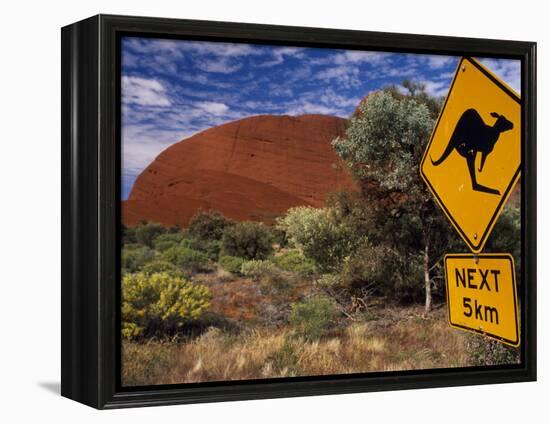 Alice Springs, Traffic Sign Beside Road Through Outback, Red Rocks of Olgas Behind, Australia-Amar Grover-Framed Premier Image Canvas