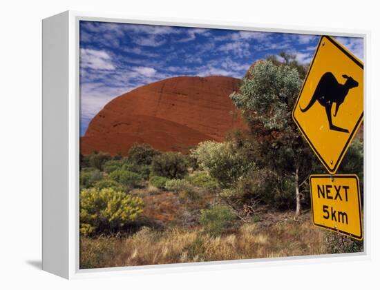 Alice Springs, Traffic Sign Beside Road Through Outback, Red Rocks of Olgas Behind, Australia-Amar Grover-Framed Premier Image Canvas